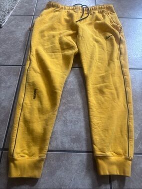 Nike NOCTA Yellow Swoosh Jogger Pants
